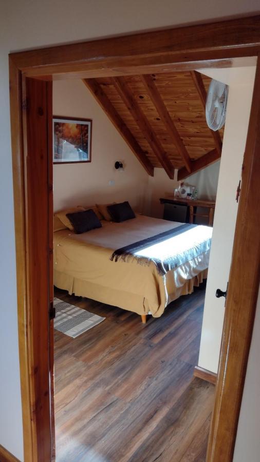 Hotel Y Cabanas Casa De Piedra Trevelín Bagian luar foto