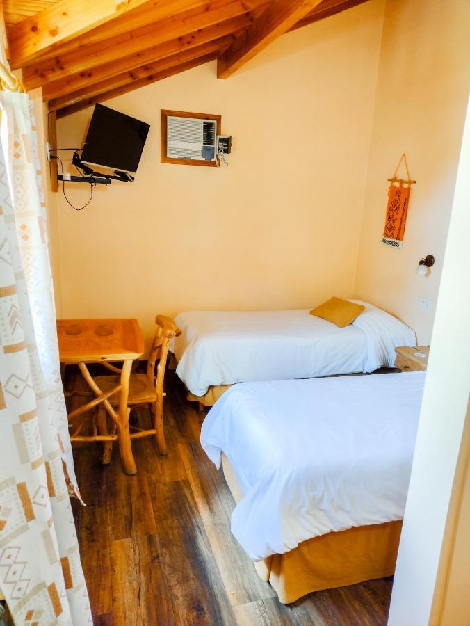 Hotel Y Cabanas Casa De Piedra Trevelín Bagian luar foto
