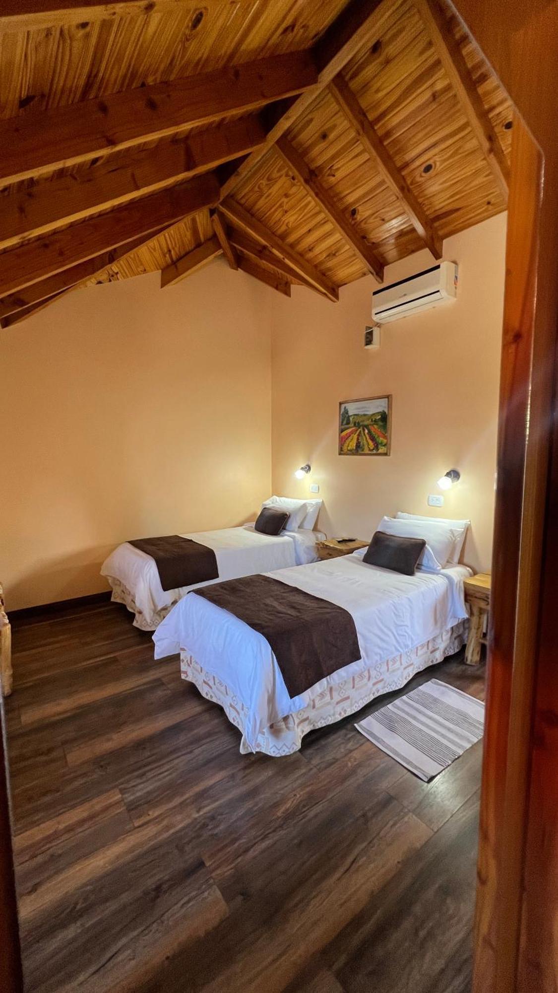 Hotel Y Cabanas Casa De Piedra Trevelín Bagian luar foto