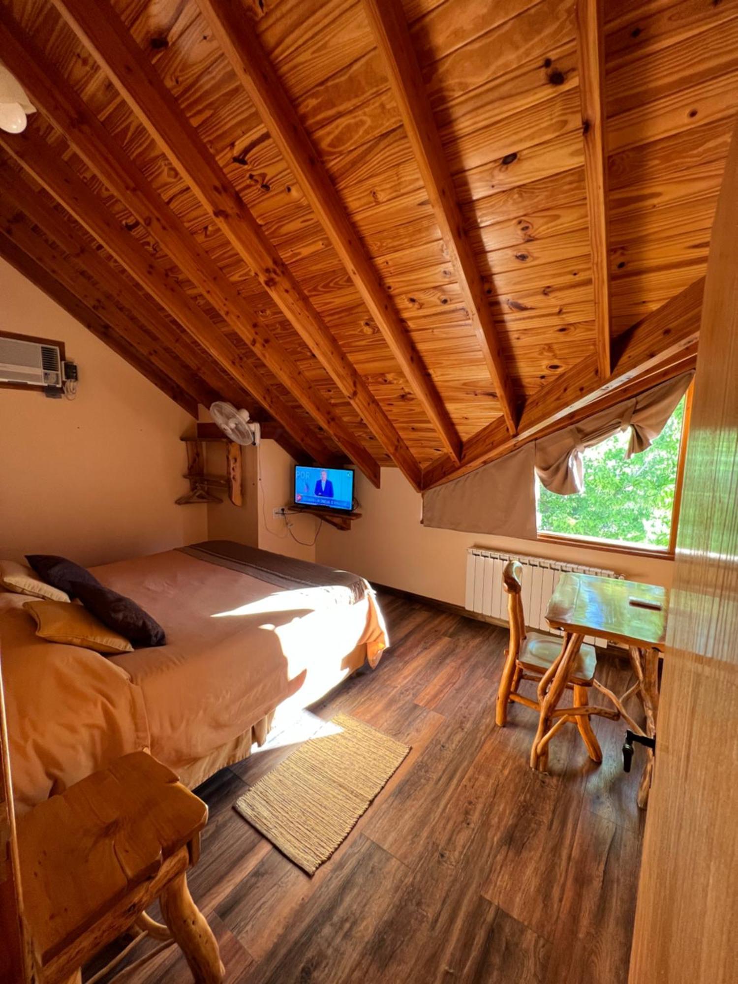 Hotel Y Cabanas Casa De Piedra Trevelín Bagian luar foto