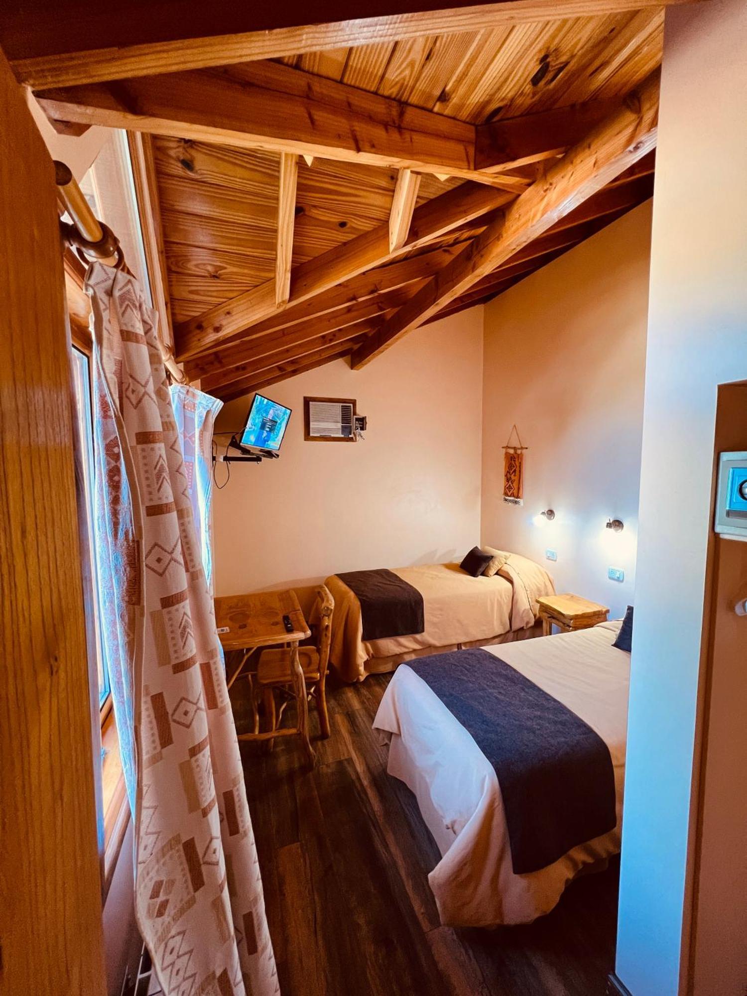 Hotel Y Cabanas Casa De Piedra Trevelín Bagian luar foto